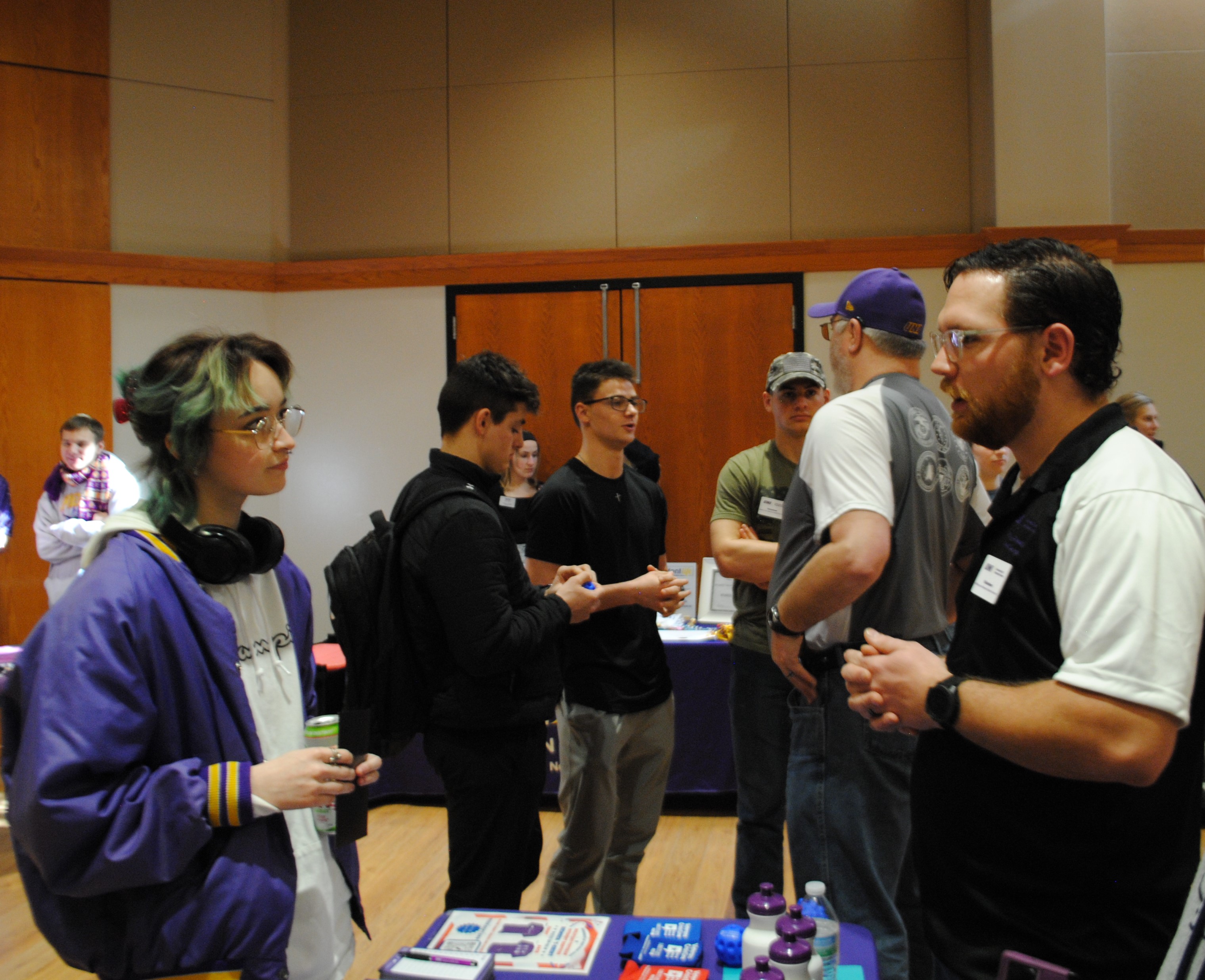 Student learning more about the Veterans Association.